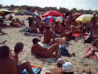 Milf suging manhood på nudist strand