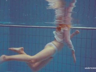 Sensational enchanting concupiscent teen cutie Melisa Darkova swimming nude alone