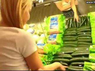 Young female fucks timun in publik supermarket